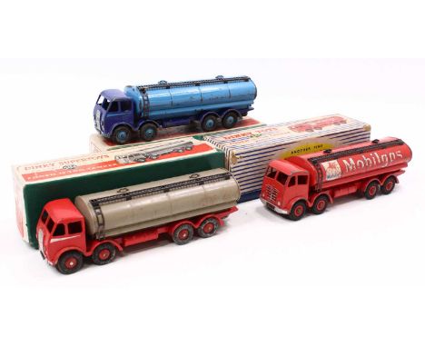 A Dinky Toys boxed model group of three, to include No. 504 Foden 14-Ton tanker in red body and grey tanker, No. 504 Foden 14
