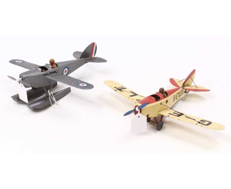 Two Meccano pre-built Constructor Aeroplanes, both in the form of a single-seater aircraft, the first one has a red &amp; cre