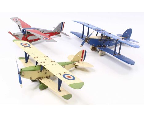 Three Meccano pre-built playworn aircraft models, the first one has a cream &amp; green fuselage with matching wings, roundel