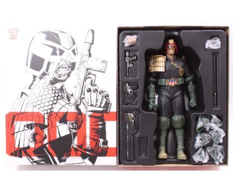 A 2000 AD 1/6 scale action figure of Judge Dredd, appears displayed and complete, housed in the original card sleeve and card