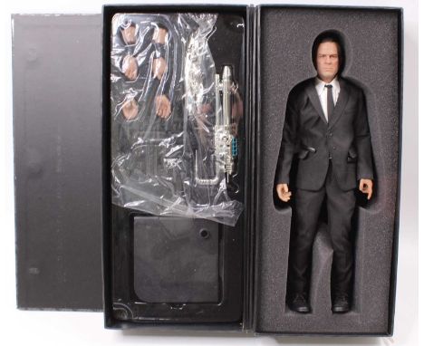 An Enterbay International Ltd 1/6 scale action figure of Agent K 'Men in Black 3', appears incomplete, housed in the original