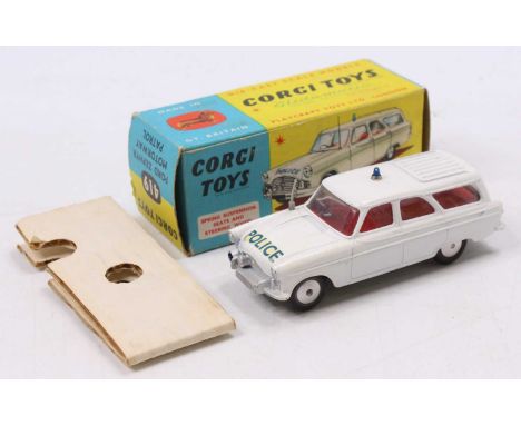 A Corgi Toys No. 419 Ford Zephyr Motorway Patrol Car, white body with red interior and spun hubs, with blue roof light, house