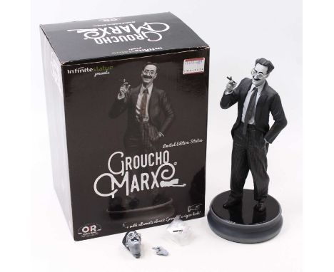 A 1/6 scale limited edition statue of Groucho Marx No. 020 by Old &amp; Rare (appears complete), housed in the original card 
