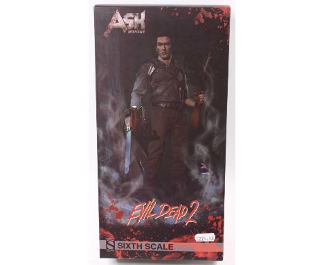 A Sideshow Collectables 1/6 scale action figure of Ash Williams 'Evil Dead 2', appears complete, housed in the original card 