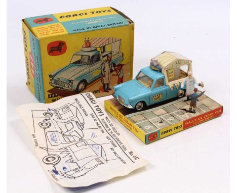 Corgi Toys No. 447 Walls Ice Cream van, comprising of a light blue body with spun hubs with ice cream man vendor figure and a