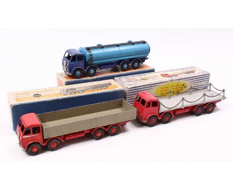 A Dinky Toys boxed model group of three, to include No. 501 Foden diesel 8-wheel wagon, having a red body with grey bed, No. 