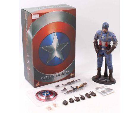 A Hot Toys Ltd 1/6 scale action figure of Captain America No. MMS156 'The First Avenger', appears complete and displayed, hou