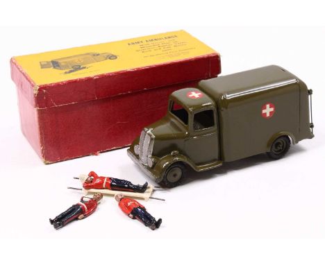 A Britains No. 1512 Army Ambulance in green body with green hubs, white cross on red roundel to sides, appears with a patient
