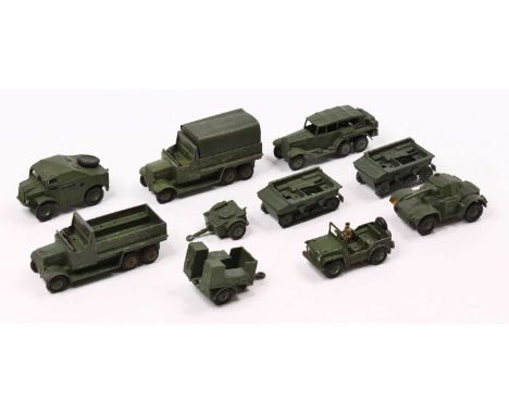 A Dinky Toys group of ten loose military models to include No. 151B 6-wheeled covered wagon truck, No. 151C Army Cooker on a 