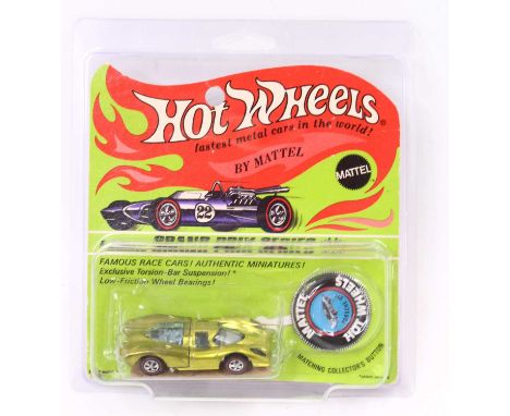 Hotwheels Mattel "Redlines" Porsche 917, metallic green-gold body, housed on the original backing card, with sticker sheet, p