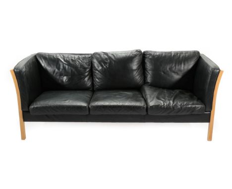 A 1970's Danish Stouby Three-Seater Sofa, with eight cushions and beech ends, 208cm by 81cm by 82cm