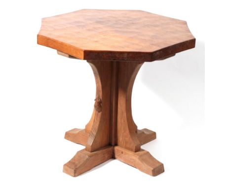 Mouseman: A Robert Thompson of Kilburn English Oak Octagonal Coffee Table, on a cruciform base, with carved mouse signature, 