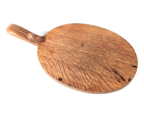 Mouseman: A Robert Thompson of Kilburn English Oak Cheese Board, with carved mouse signature on handle, 40cm