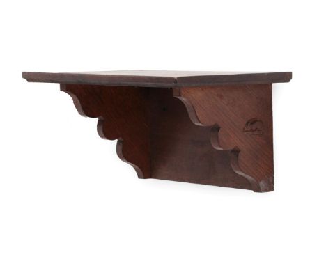 Mouseman: A Robert Thompson of Kilburn English Oak Wall Bracket, the rectangular top on two shaped supports, with recessed ca