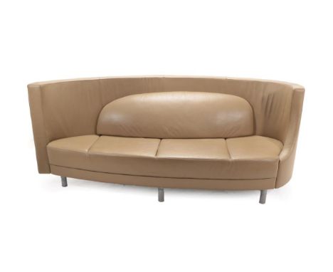 A Three-Seater Curved Sofa, modern, covered in beige leather with stitched detail, oval padded back support and rounded arms,