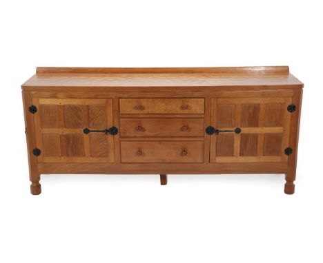 Mouseman: A Robert Thompson of Kilburn Panelled English Oak 6ft Sideboard, with raised upstand over two cupboard doors, with 