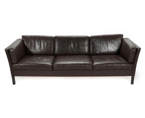 A 1970's Danish Sofa, upholstered in vintage brown leather, 216cm by 79cm by 73cm