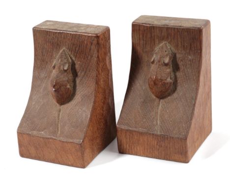 Mouseman: A Pair of Robert Thompson of Kilburn English Oak Bookends, each with carved mouse signature, 15.5cm high 