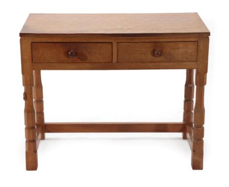 Mouseman: A Robert Thompson of Kilburn English Oak Hall Table, the rectangular top with two drawers below, on four octagonal 