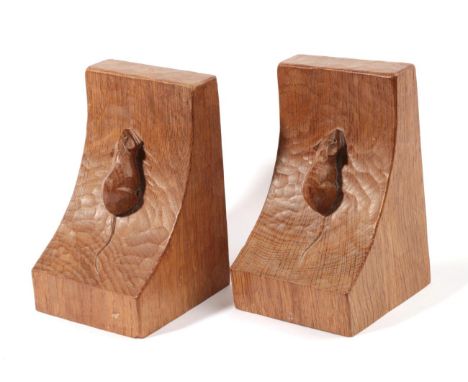 Mouseman: A Pair of Robert Thompson of Kilburn Single Mouse English Oak Bookends, each with carved mouse signature, 15.5cm