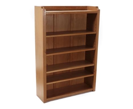 Mouseman: A Robert Thompson of Kilburn English Oak 4' Open Bookcase, solid ends and panelled back, raised upstand, four adjus