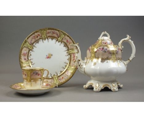 An English porcelain tea service, circa 1840-60,decorated in a yellow and gilt colourway with flowers,comprising seventeen te