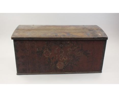 A painted oak trunk 19th century with slightly domed planked top and iron lock plate, the front and sides painted with flower