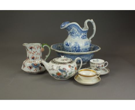 A Wedgwood tea service in the Kutani Crane pattern, a late 19th century blue and white transfer-printed wash basin and jug, a