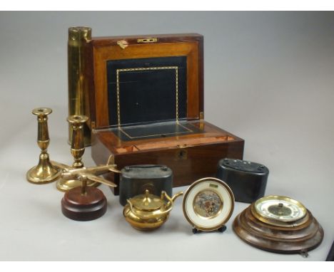 A Victorian mahogany lap desk, a circular wall barometer, a pair of 19th century oval based copper candlesticks, a shell case