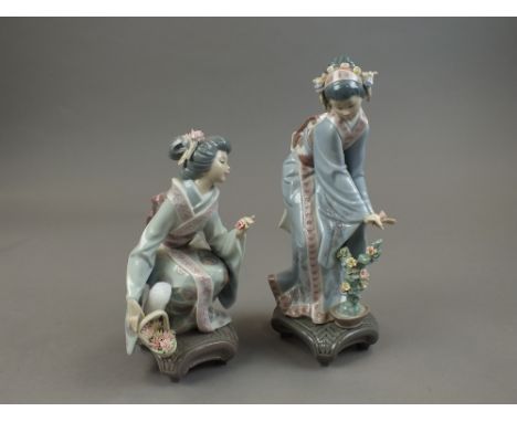 A pair of Lladro figures of 'Mayumi', no. 1449 and 'Yuki', no. 1448, 24cm high (2)