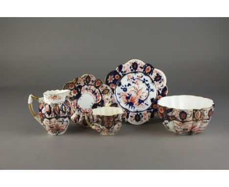 A Wileman Foley China Japan Imari part tea service, early 20th century, pattern 6075, comprising ten teacups (one a.f), eleve