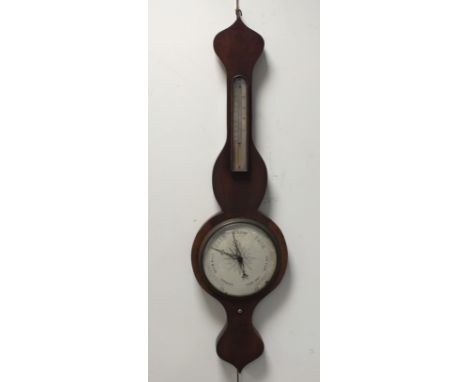 A 19th century mahogany framed onion top 'wheel' barometer with silvered thermometer and 8 inch white dial, 95cm high