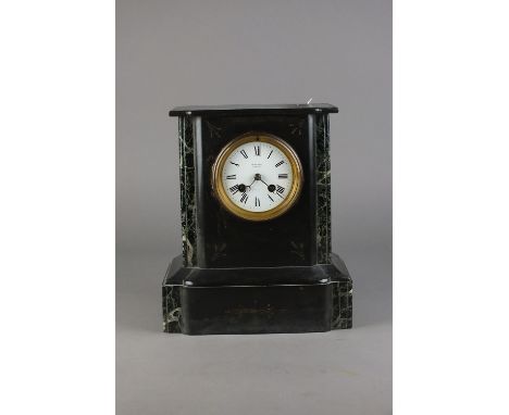 A Victorian black marble mantel clock, 3½ white enamel dial with Roman numerals and marked 'McKenzie, 2 Cannon Street, Dover'