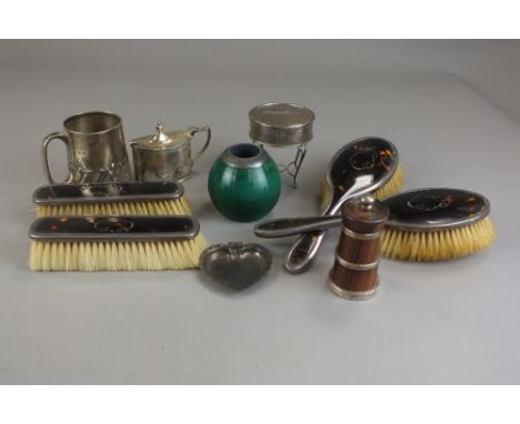 A five piece silver and tortoiseshell mounted dressing table set, together with a Victorian silver mug, two silver mounted wo