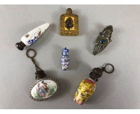 Collection of six ceramic, glass, gold gilt, painted and tapestry scent bottles 