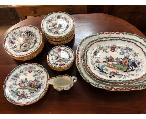 Collection of late Victorian Ashworth Bros Hanley ironstone dinner ware in a Chinoiserie style pattern with birds and flowers