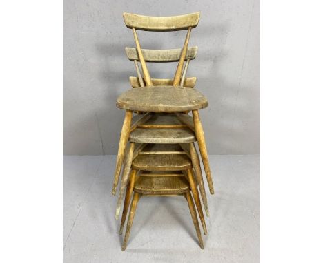 Set of four early Ercol tapered, stick back stacking chairs