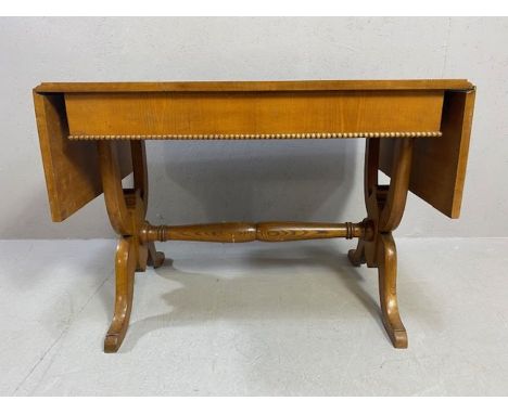 Drop leaf light wood sofa table with turned stretcher and beaded detailing unextended, approx 88cm x 59cm x 65cm 