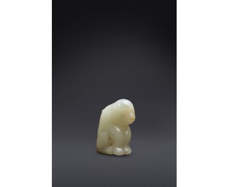 A RARE CHINESE PALE CELADON JADE FELINE OF SUPERB QUALITYPROBABLY SONG DYNASTY The feline seated on its haunches, facing forw