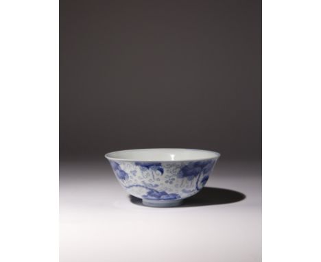 A CHINESE BLUE AND WHITE 'SQUIRRELS AND GRAPE VINE' BOWL KANGXI 1662-1722 The deep rounded sides rising from a gently splayed