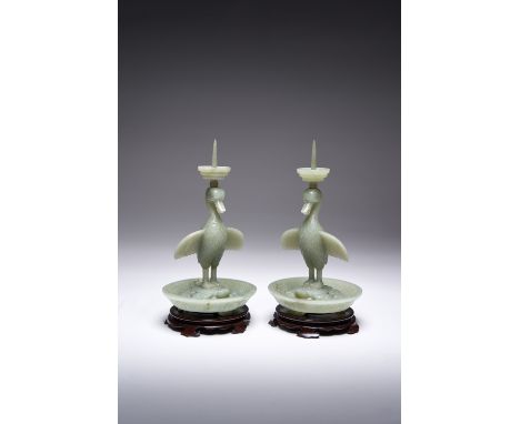A PAIR OF CHINESE CELADON JADE GOOSE AND TORTOISE PRICKET CANDLESTICKS QIANLONG 1736-95 Each carved with outstretched wings c