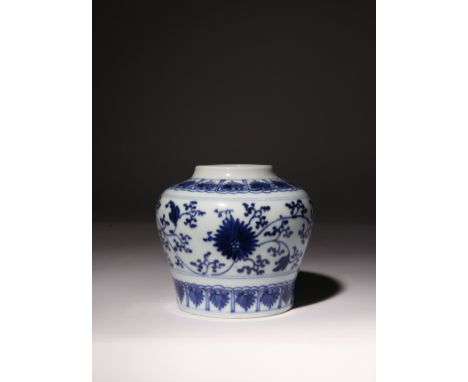 A CHINESE BLUE AND WHITE 'TIAN' JAR KANGXI 1662-1722 The ovoid body painted with large stylised flowerheads amidst scrolling 