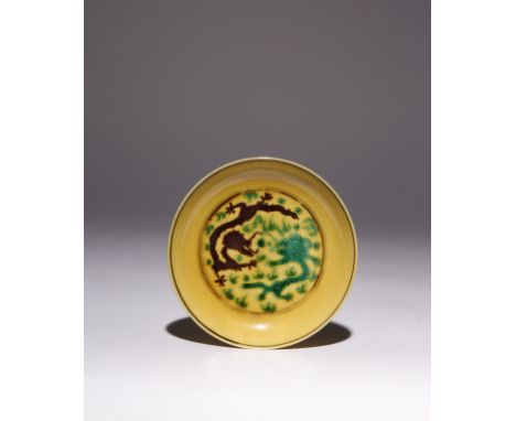 A CHINESE IMPERIAL YELLOW-GROUND 'DRAGON' SAUCER DISH SIX CHARACTER GUANGXU MARK AND OF THE PERIOD 1875-1908 Decorated to the