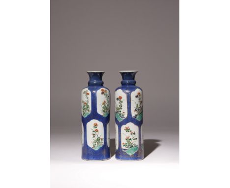 A NEAR PAIR OF CHINESE FAMILLE VERTE CYLINDRICAL VASES KANGXI 1662-1722 Each decorated with panels containing different flowe