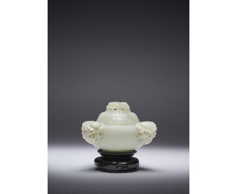 A CHINESE PALE CELADON JADE INCENSE BURNER AND COVER QIANLONG 1736-95 Raised upon a short splayed foot, the rounded sides car