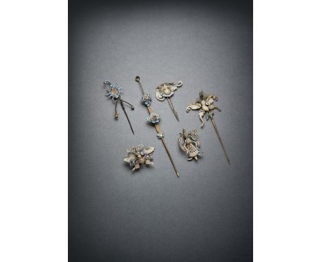 SIX CHINESE IMPERIAL GILT-METAL AND KINGFISHER FEATHER HAIR ORNAMENTS QING DYNASTY Variously shaped as butterfies, a bat, a s