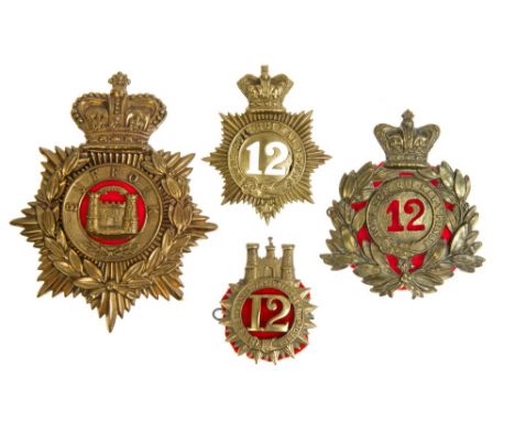 Three 12th (Suffolk) Regiment badges and QEII Suffolk Regiment blue cloth helmet plate (4)