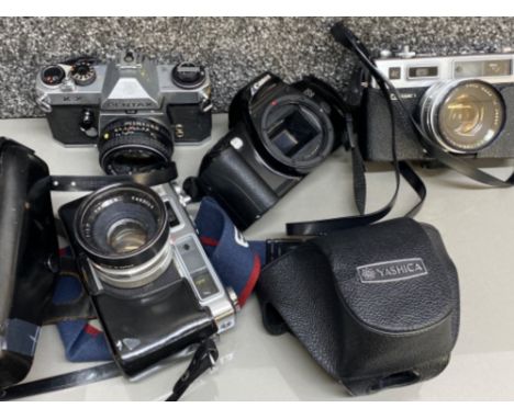 4x vintage cameras includes Canon EOS 500, Pentax KIX, &amp; 2x Yashica cameras