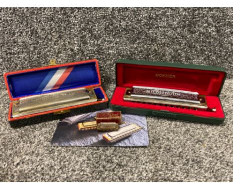 2 boxed super chromonica chromatic harmonica also including a vintage Hohner miniature harmonica