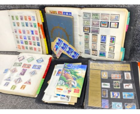 5 vintage stamp albums containing miscellaneous stamps from around the world